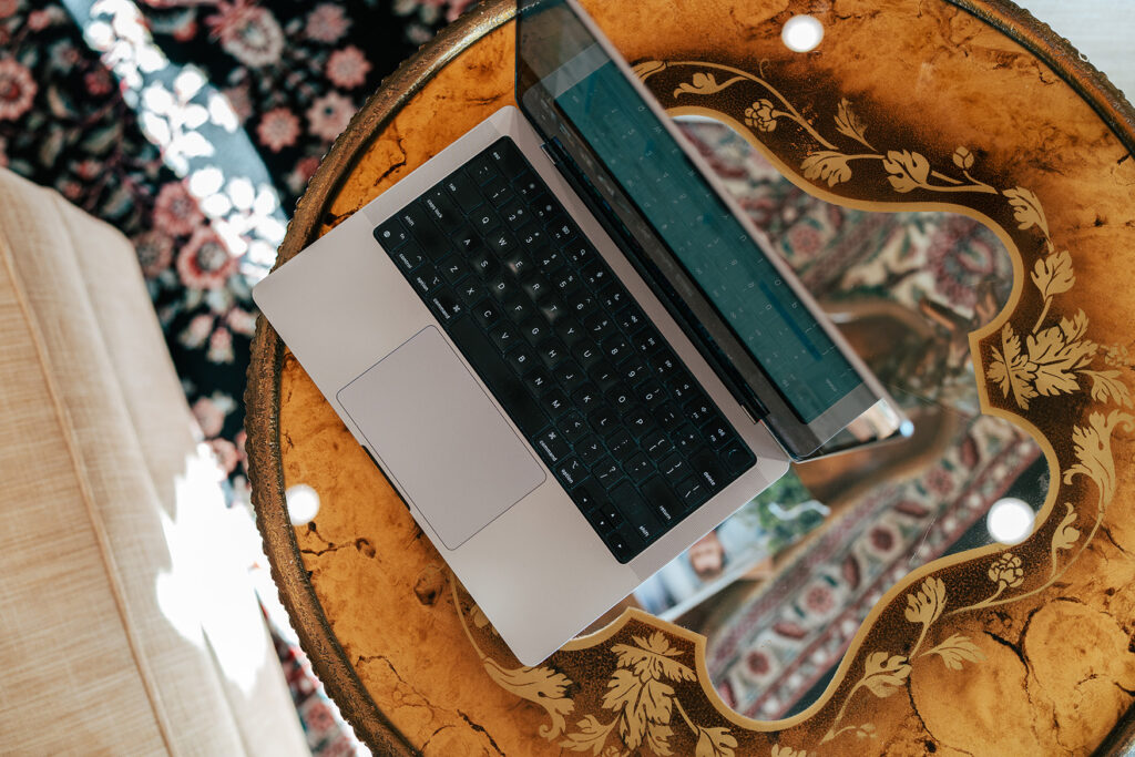 Laptop on a decorative table at Inisfree Estate