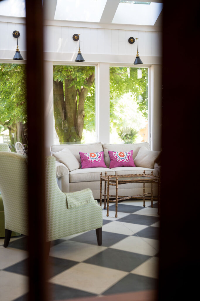 An elegant sun room on a beautiful, bright day at Inisfree Estate